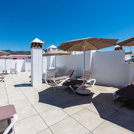 Apartamentos Toboso Plaza Nerja Exterior photo Rooftop pool at the Hotel