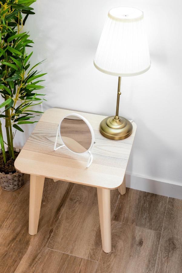 Apartamentos Toboso Plaza Nerja Exterior photo A table mirror