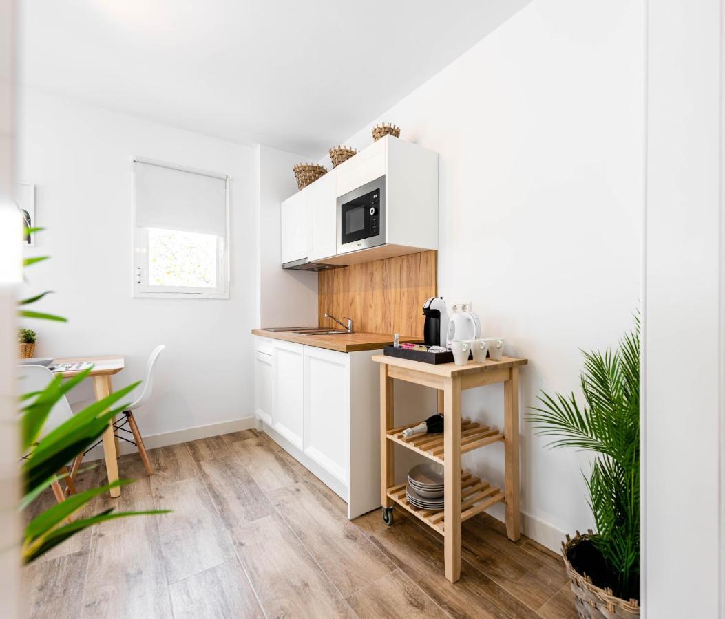 Apartamentos Toboso Plaza Nerja Exterior photo A small kitchen in a micro apartment