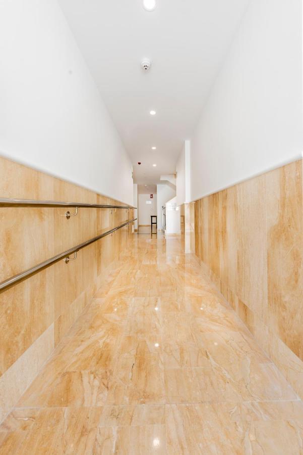 Apartamentos Toboso Plaza Nerja Exterior photo Interior of the building